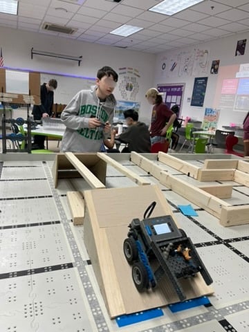 Students working with VEX robots