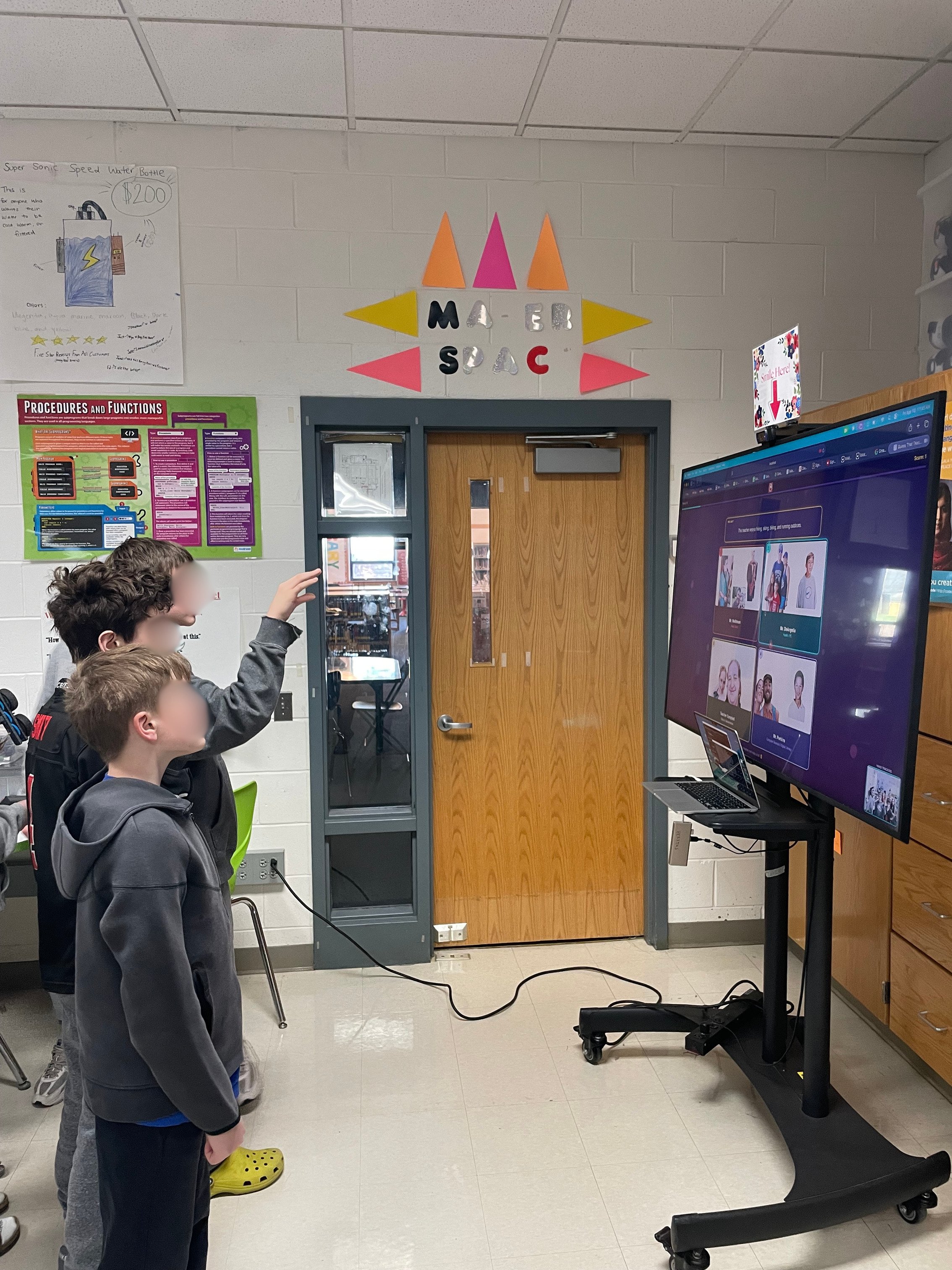 Students testing Guess That Teacher in the makerspace